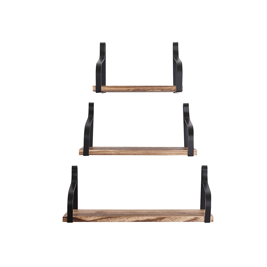 Levede Floating Shelf Brackets showcasing three wooden shelves mounted on a wall, displaying decorative items and plants.
