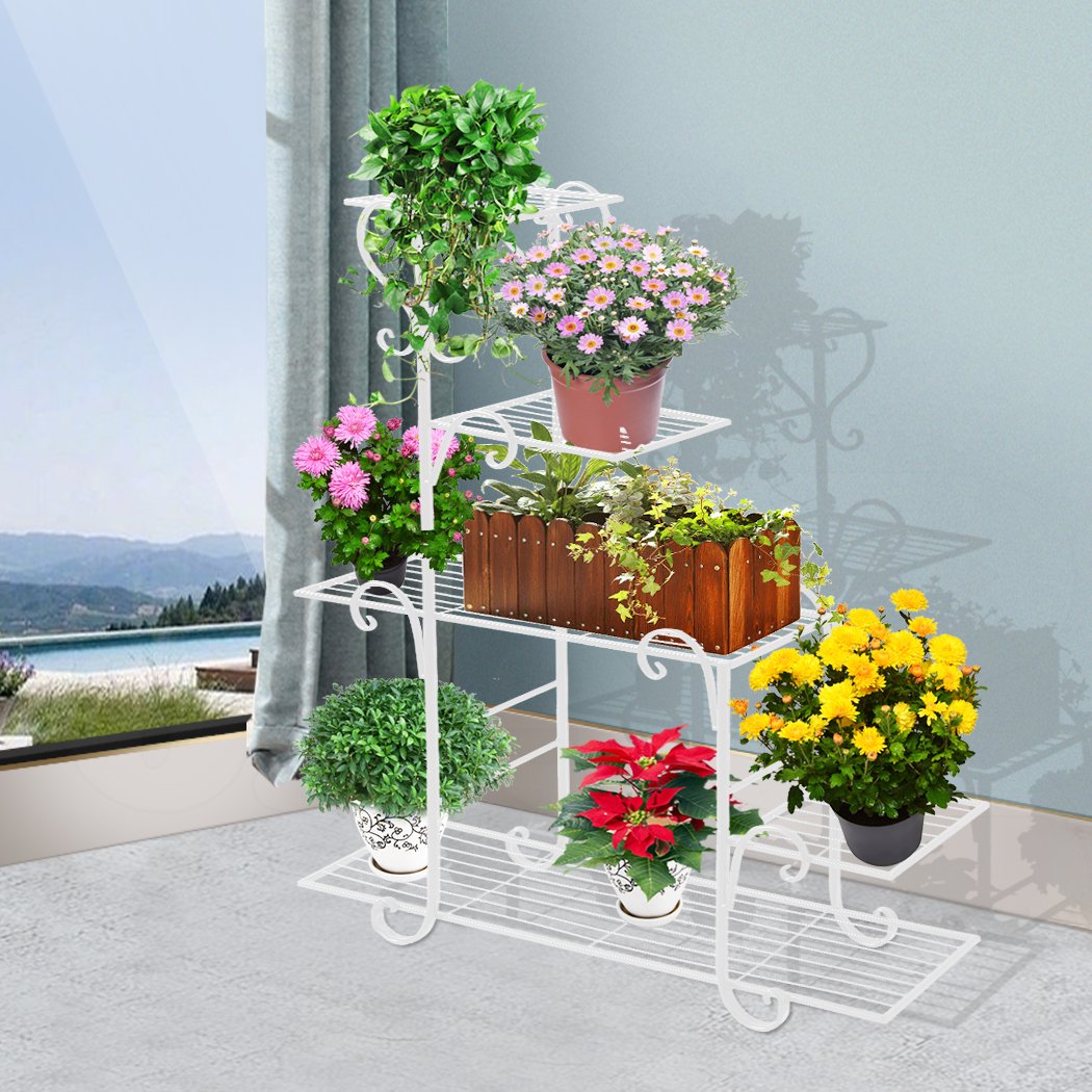 Levede Outdoor Indoor Plant Stand in white, showcasing multiple potted plants on a stylish metal shelf.