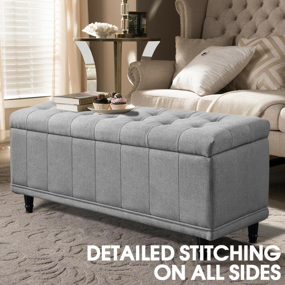 Levede Storage Ottoman in dark grey fabric, showcasing its plush design and spacious storage capacity.