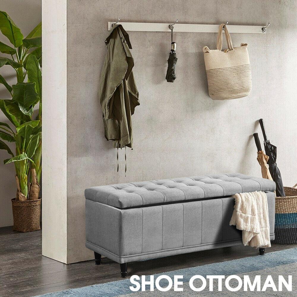 Levede Storage Ottoman in dark grey fabric, showcasing its plush design and spacious storage capacity.