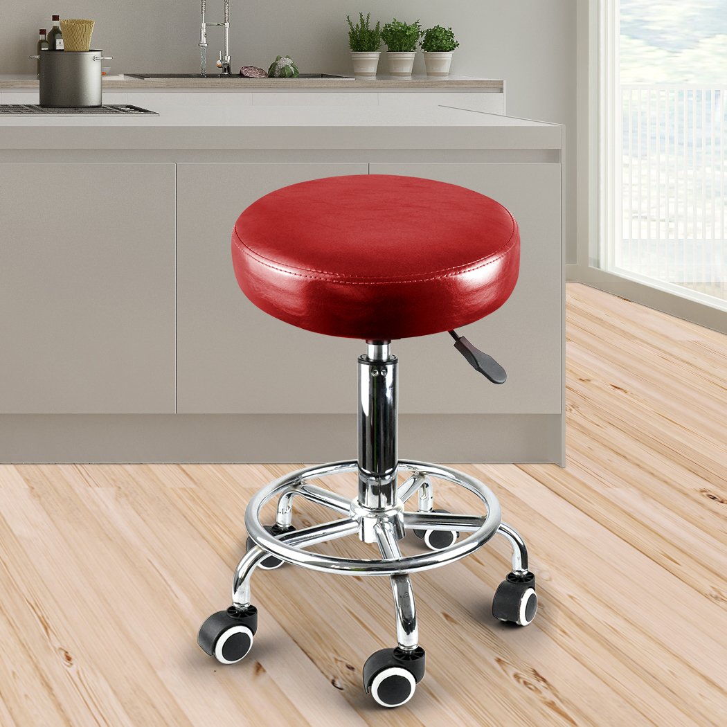 Levede Swivel Salon Bar Stool in red with PU leather seat and steel frame, featuring 360° rotation and smooth-rolling casters.