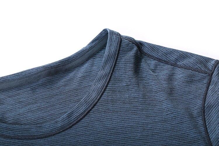 Lightweight Pima cotton workout shirt for men, showcasing its quick-dry fabric and comfortable fit, ideal for athletic activities.