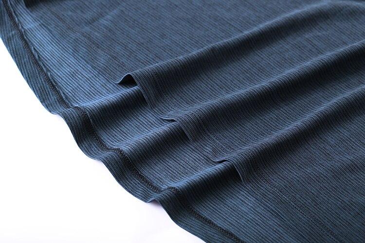 Lightweight Pima cotton workout shirt for men, showcasing its quick-dry fabric and comfortable fit, ideal for athletic activities.