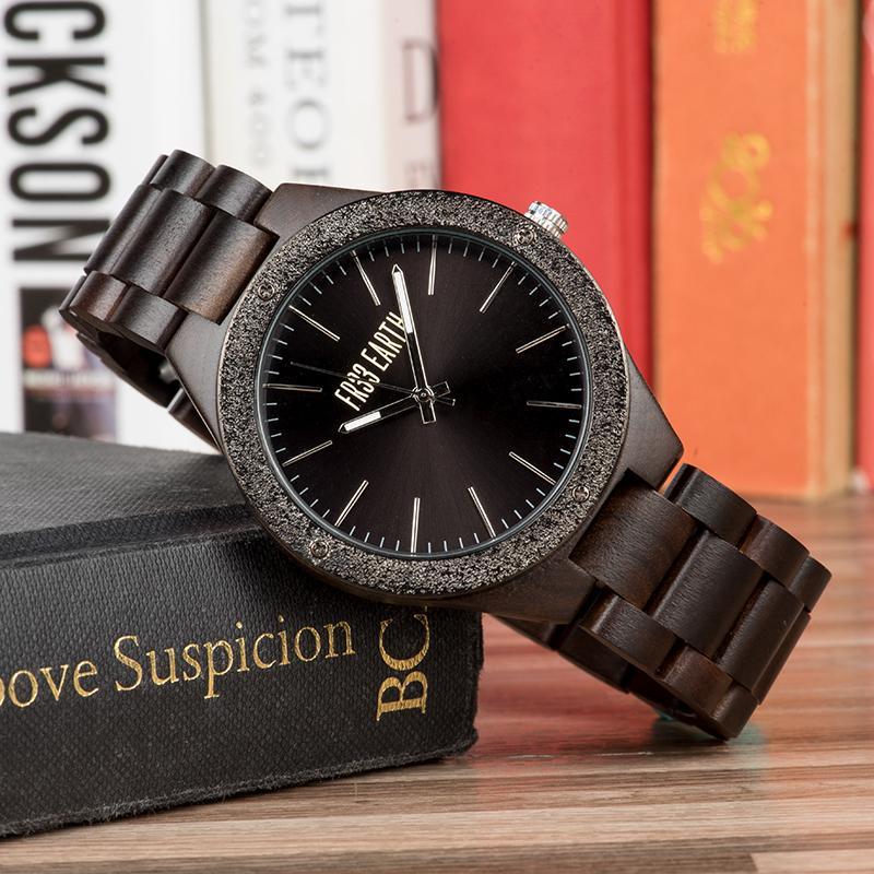 Luminous wood watch featuring a unique design with a natural wood band and metal case, showcasing elegance and sustainability.