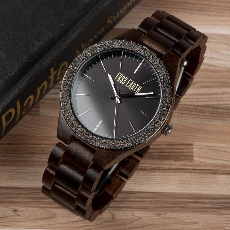 Luminous wood watch featuring a unique design with a natural wood band and metal case, showcasing elegance and sustainability.