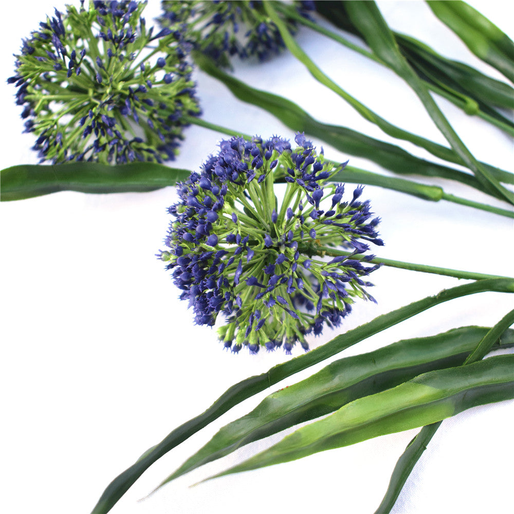 Lush Flowering Purple Hydrangea Stem, featuring vibrant purple blooms and lush green leaves, perfect for floral arrangements.