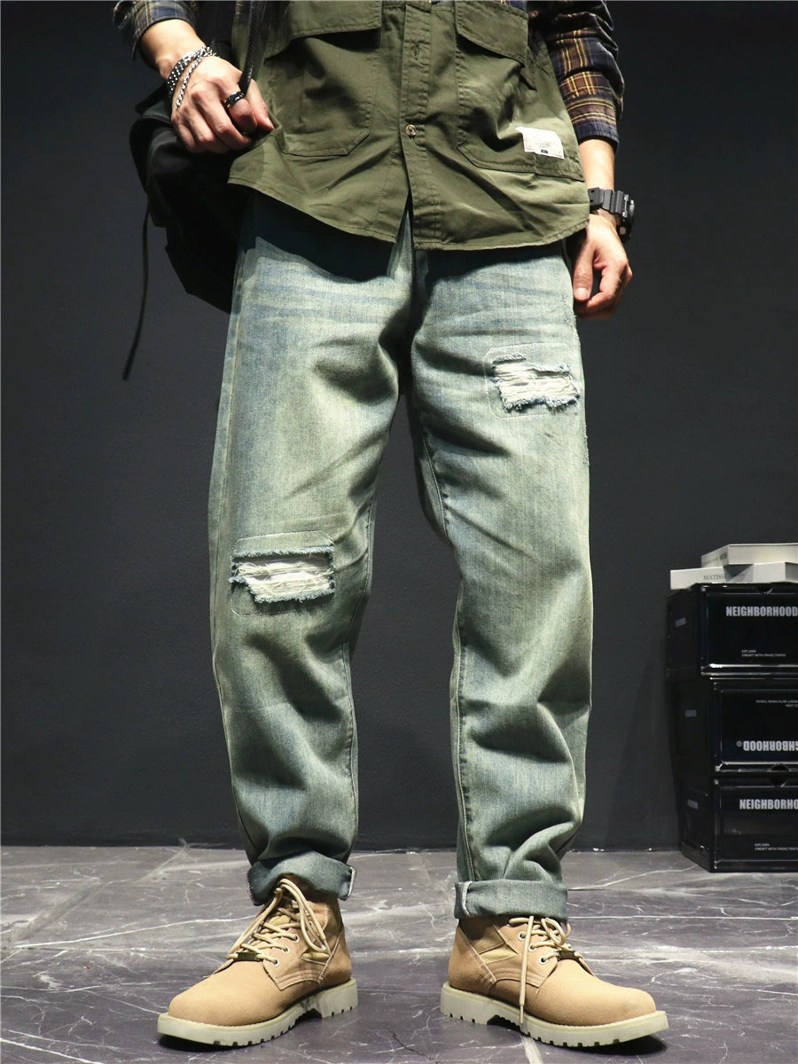 Men's Magic Ship Autumn Ripped Jeans featuring trendy ripped design and comfortable fit, perfect for autumn fashion.