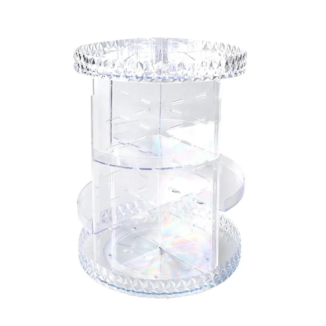 A clear acrylic rotating cosmetic organizer with a diamond shape design, featuring three tiers for makeup storage.