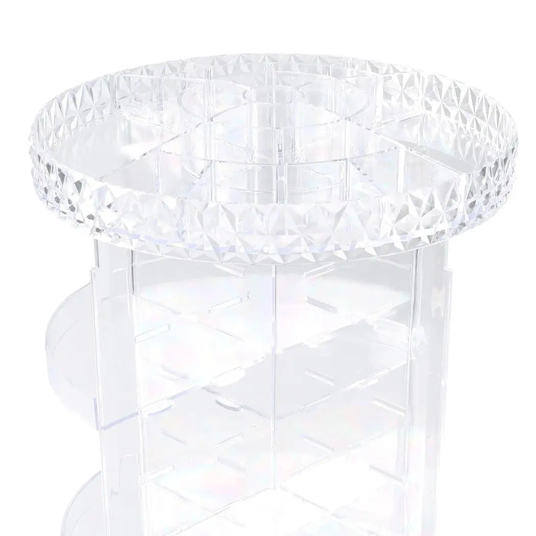 A clear acrylic rotating cosmetic organizer with a diamond shape design, featuring three tiers for makeup storage.