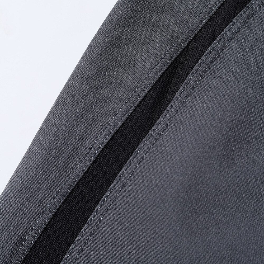 Men's 7 Inch Running Shorts in blue, gray, and black, featuring a 2-in-1 design and a pocket for essentials.