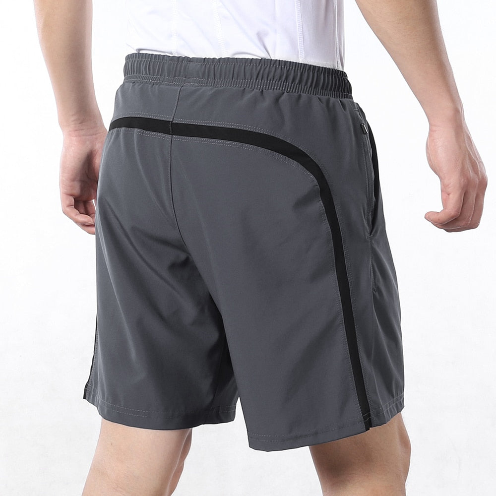 Men's 7 Inch Running Shorts in blue, gray, and black, featuring a 2-in-1 design and a pocket for essentials.