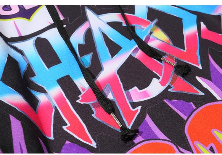 Men's oversized hoodie featuring graffiti print in purple and white, designed for high street fashion.