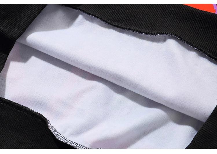 Men's oversized hoodie featuring graffiti print in purple and white, designed for high street fashion.