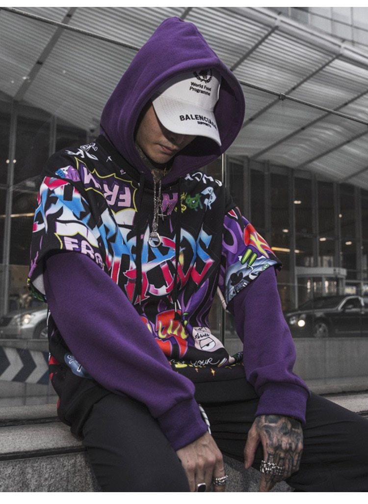 Men's oversized hoodie featuring graffiti print in purple and white, designed for high street fashion.