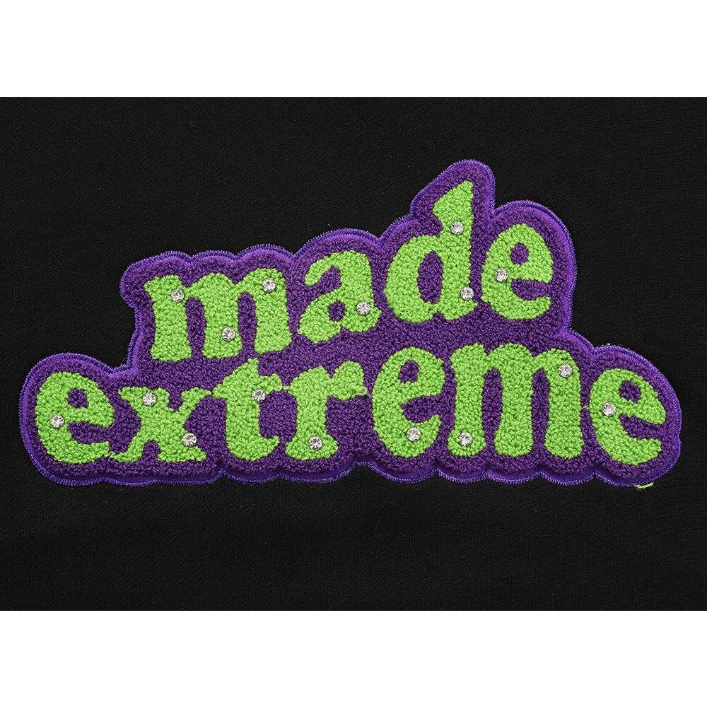 Men's hooded sweatshirt featuring colorful letter patches and diamond accents, with a large front pocket, perfect for casual streetwear.