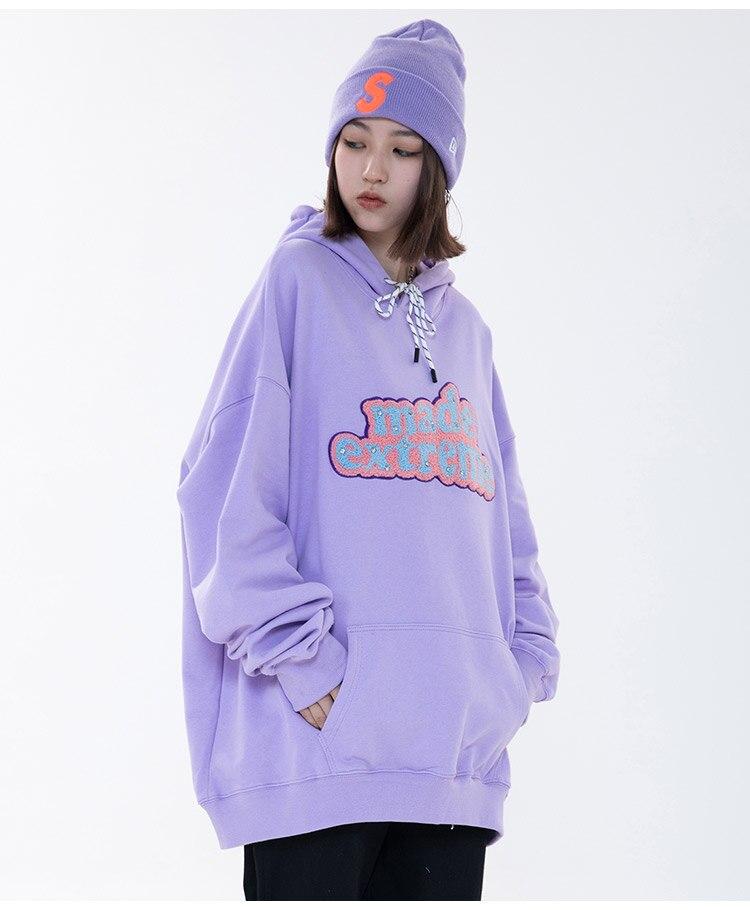 Men's hooded sweatshirt featuring colorful letter patches and diamond accents, with a large front pocket, perfect for casual streetwear.