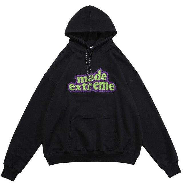 Men's hooded sweatshirt featuring colorful letter patches and diamond accents, with a large front pocket, perfect for casual streetwear.