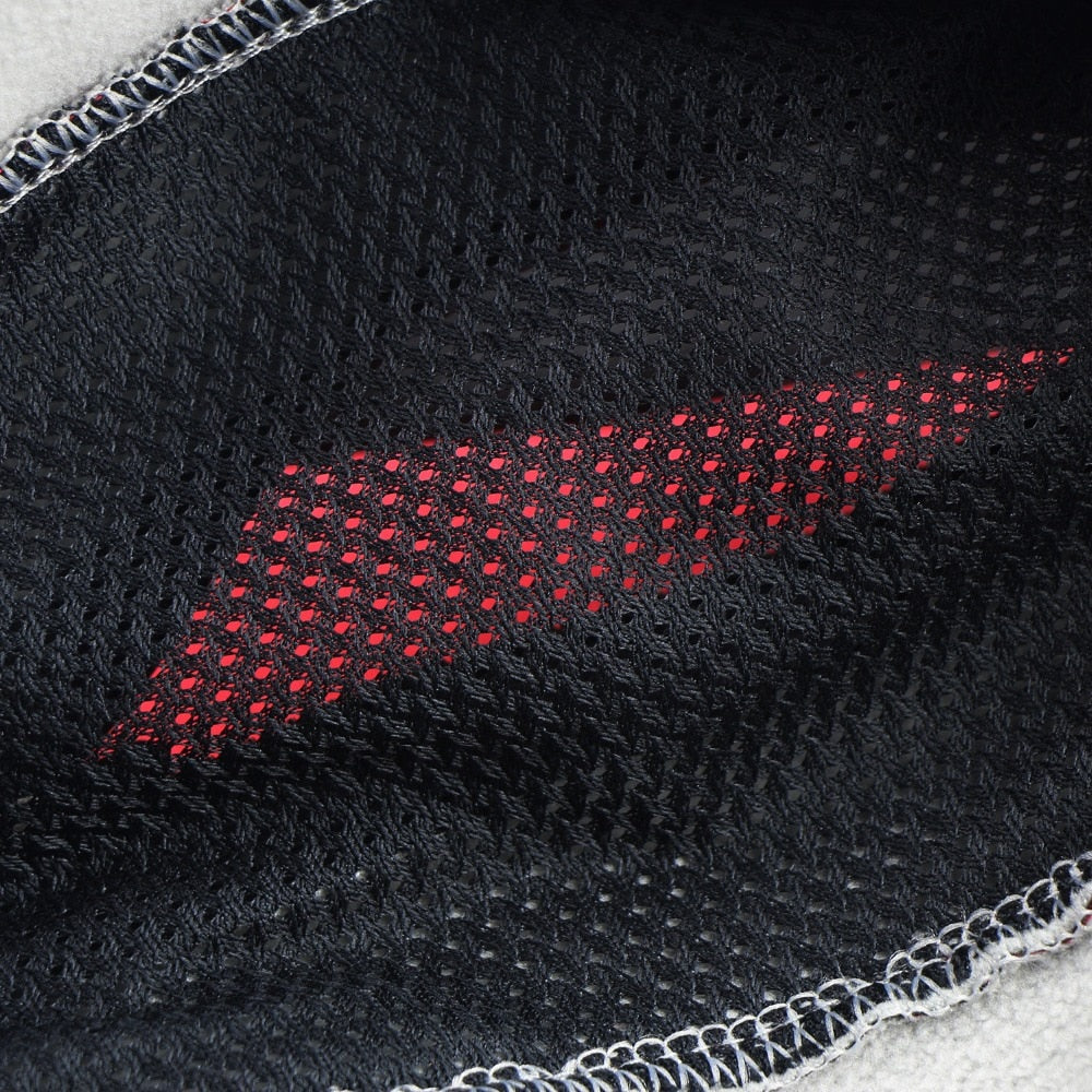 Men's winter thermal cycling jacket in black, featuring windproof and waterproof materials, reflective elements, and multiple pockets for convenience.