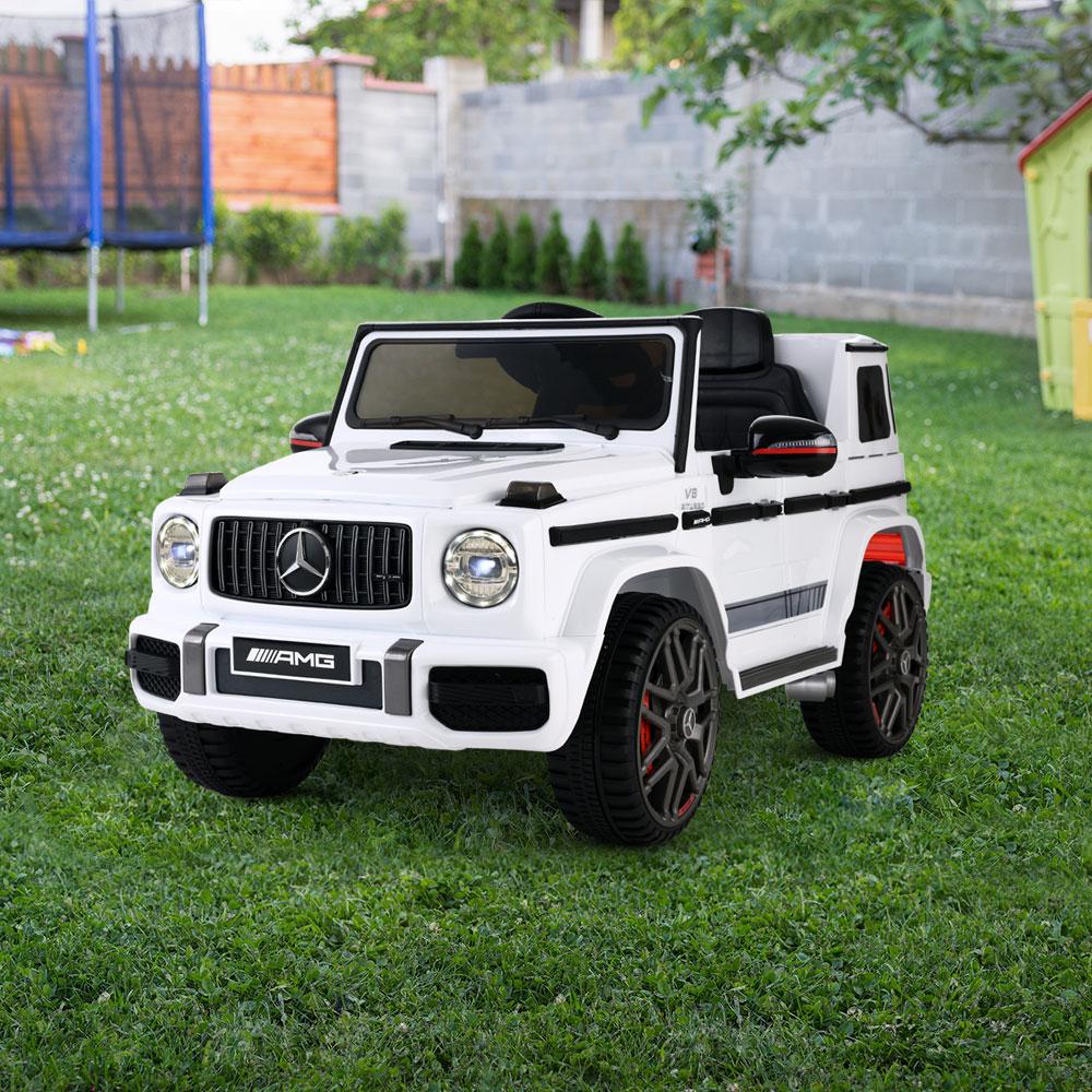 Mercedes-Benz Kids Ride On Car Electric AMG G63 in white color, featuring realistic design, headlights, and remote control.