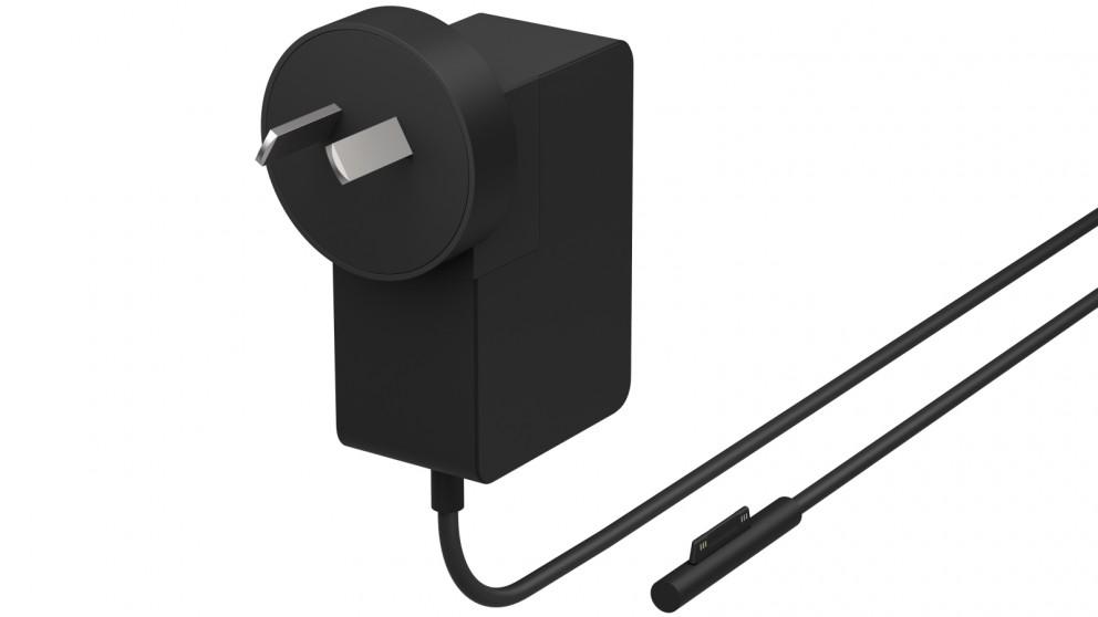 Microsoft Surface 24w Power Adaptor designed for Surface Go, featuring a compact and portable design for efficient charging.