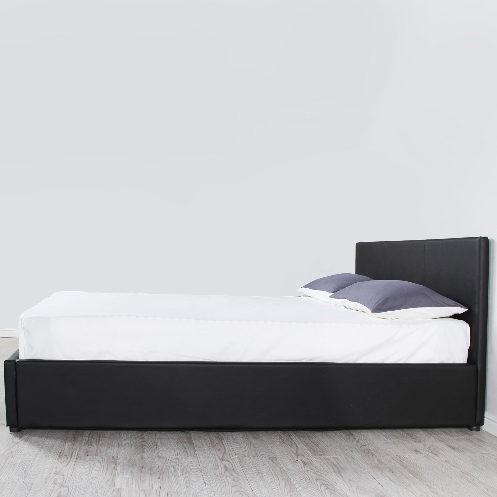 Milano Luxury Gas Lift Bed Frame and Headboard in Queen Black, showcasing modern design and gas lift functionality.