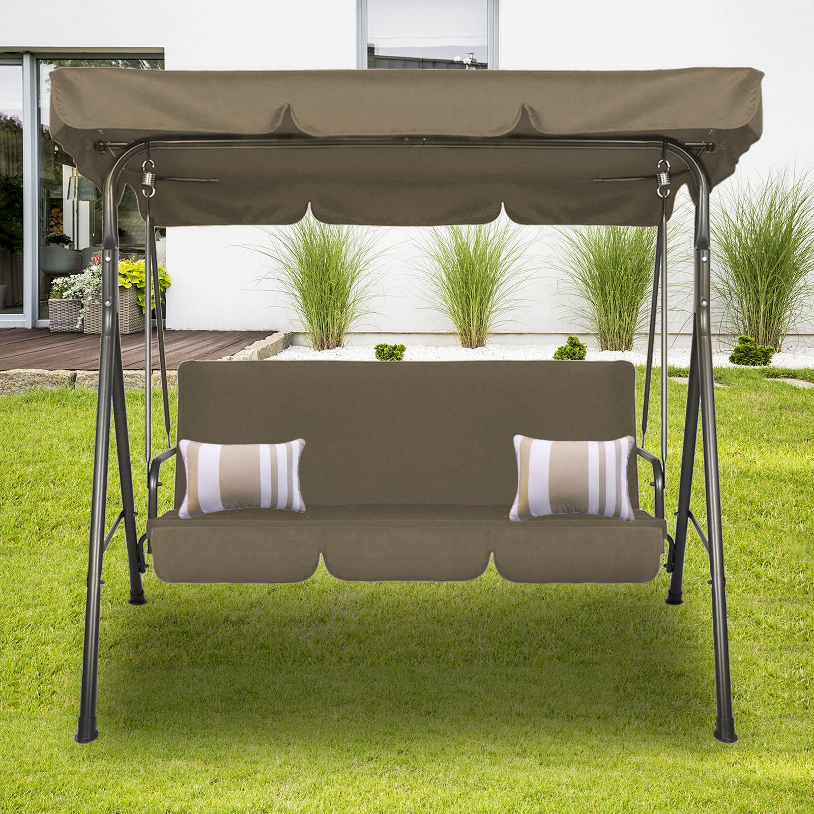 Milano Outdoor Swing Bench with canopy, seating three people in a garden setting, showcasing its durable steel frame and soft upholstery.