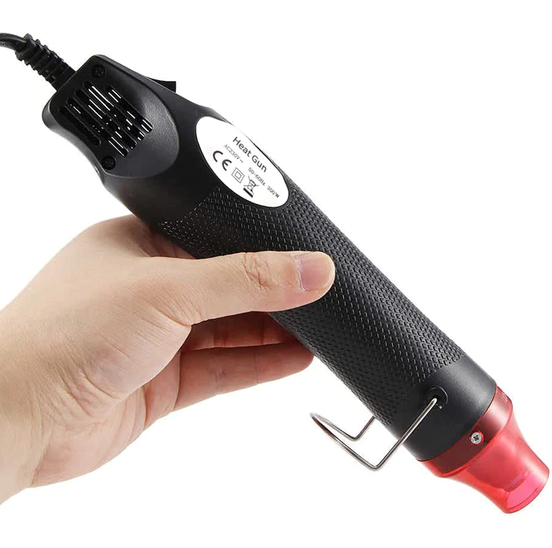 Mini Heat Gun DIY Electric Nozzles Tool with ergonomic design and stainless steel stand for easy crafting and embossing.