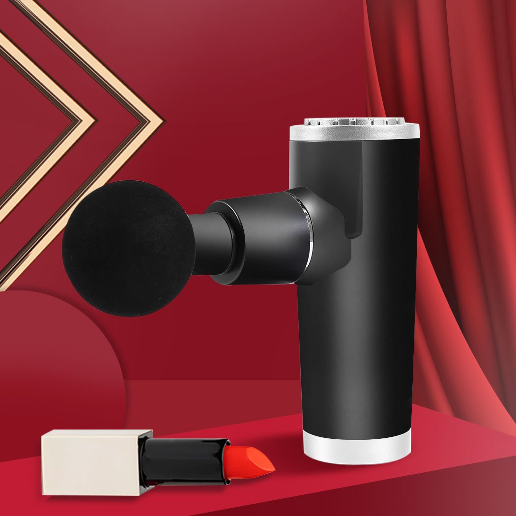 Mini Massage Gun in black color with four interchangeable heads and USB charging cable, designed for muscle relaxation and pain relief.