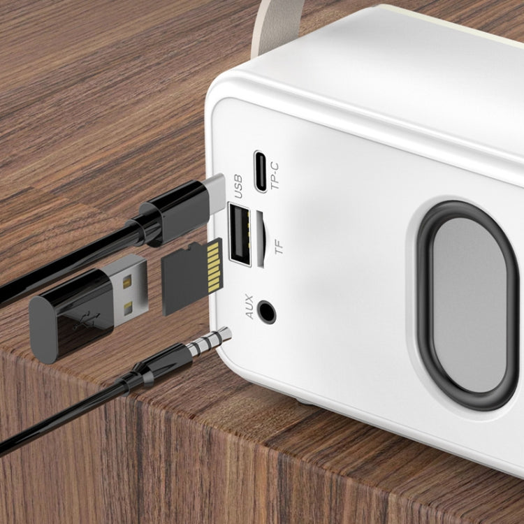 Mini Retro HIFI Level Stereo Sound Handheld Portable Bluetooth speaker with leather handle and knob design, showcasing its compact size and stylish finish.