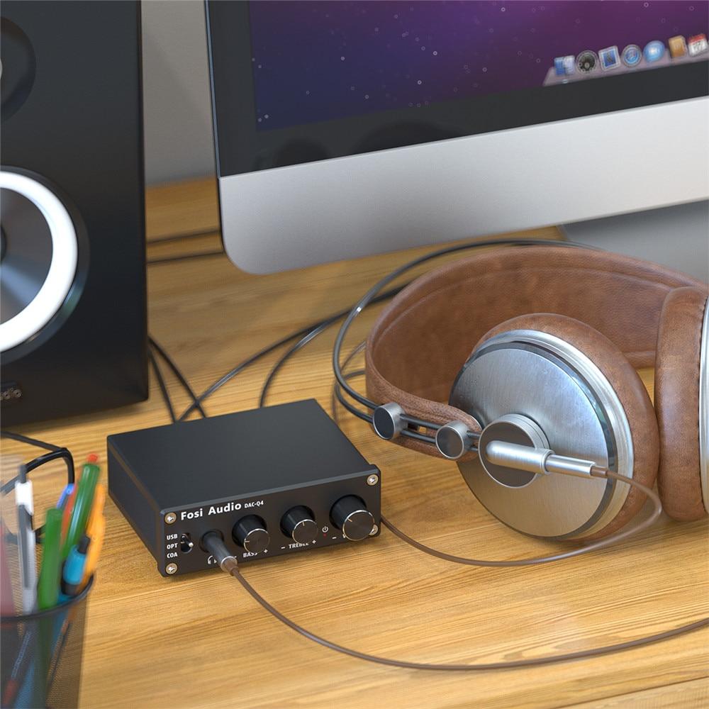 Mini Stereo USB Gaming DAC and Headphone Amplifier with USB, RCA, and headphone jack connections, designed for enhanced audio performance.