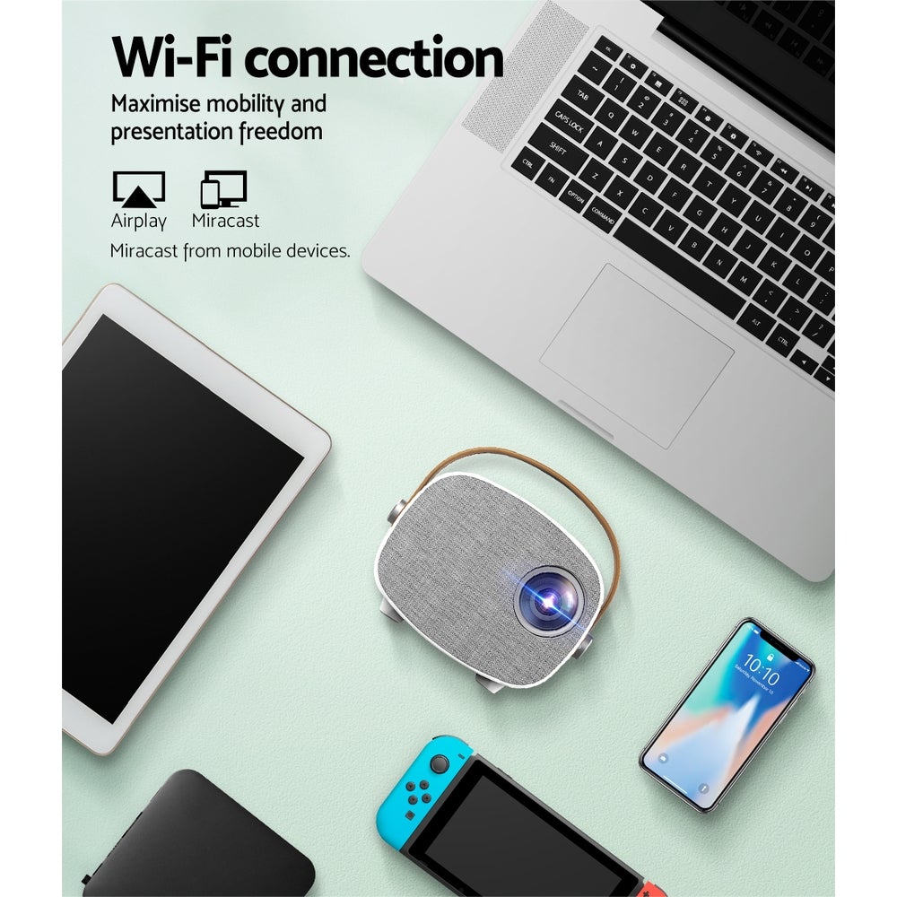 Mini Video Projector with Wi-Fi, USB, and HDMI ports, showcasing its compact design and built-in speaker.