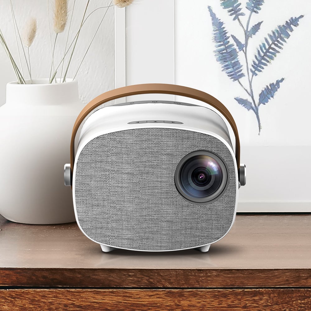 Mini Video Projector with Wi-Fi, USB, and HDMI ports, showcasing its compact design and built-in speaker.