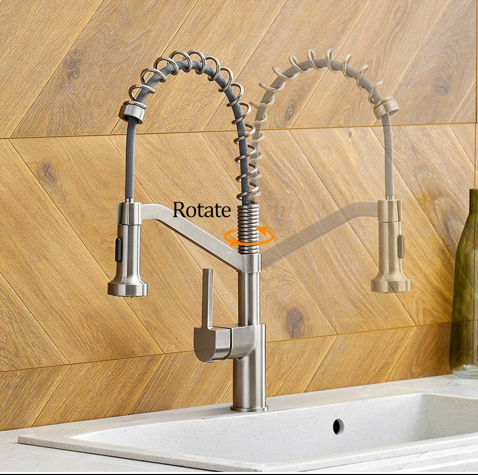 Modern polished chrome brass kitchen sink faucet with pull-out spray and single handle design, showcasing its sleek and contemporary style.