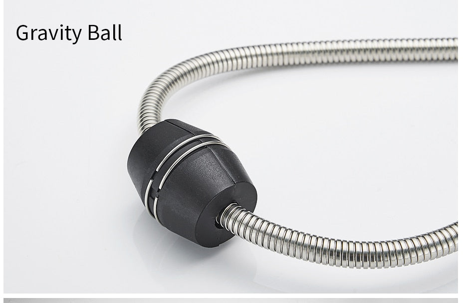 Modern polished chrome brass kitchen sink faucet with pull-out spray and single handle design, showcasing its sleek and contemporary style.