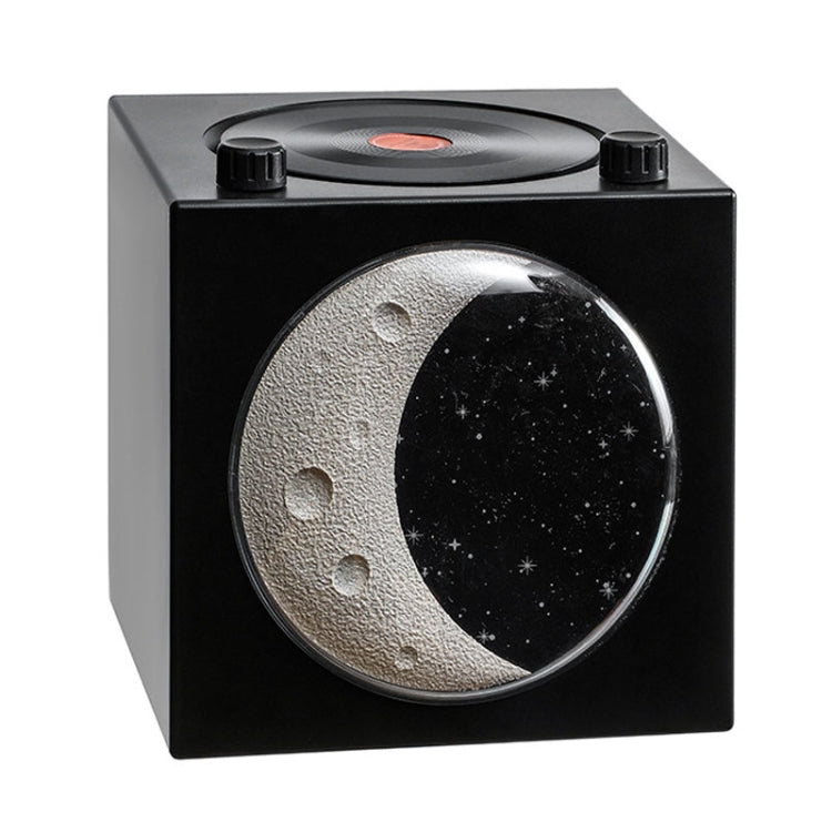 Moon Starry Sky Atmosphere Light Bluetooth Speaker with warm starry sky projection and retro vinyl record design.