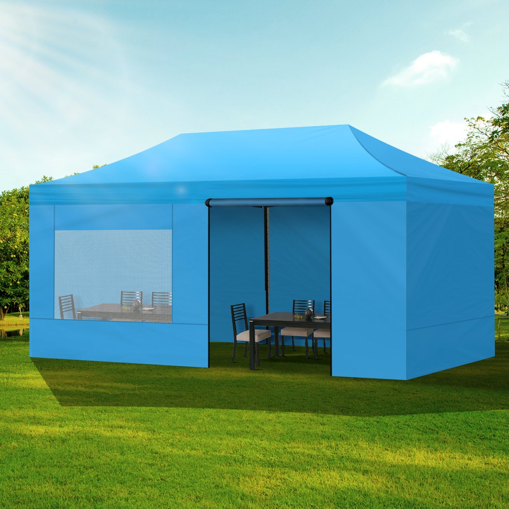 Mountview Gazebo Tent 3x6 with blue canopy and mesh walls, set up outdoors for camping or events.