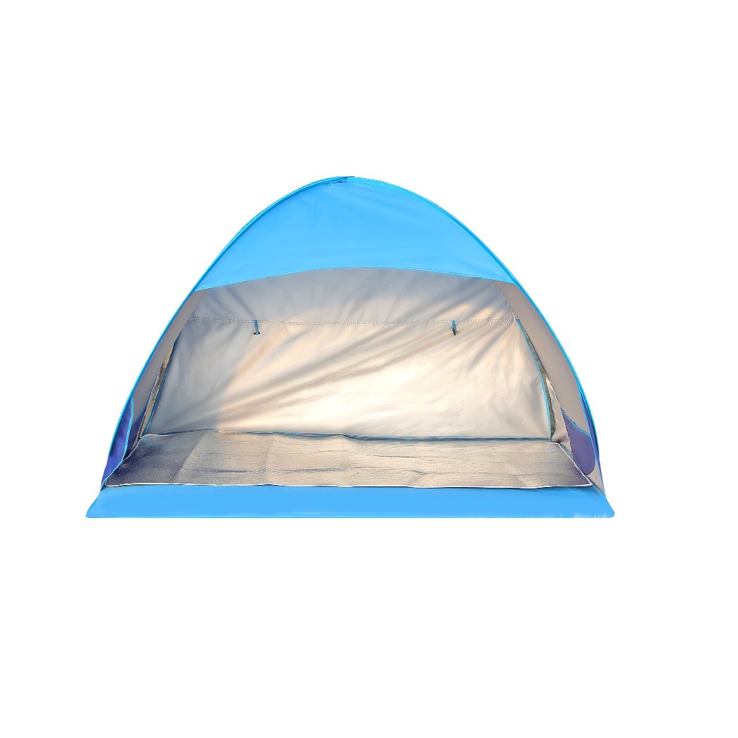 Mountview Pop Up Tent set up on a beach, spacious enough for 2-3 people, featuring a blue color and surrounded by sand and beach scenery.