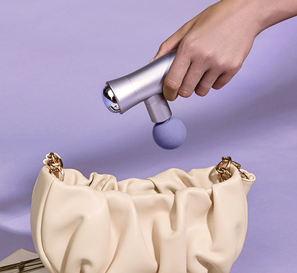 Moyun Fascia Gun Muscle Relaxation Massager in sleek design, showcasing its ergonomic shape and high-quality aluminum alloy body.