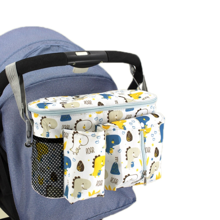 Multifunctional baby stroller storage bag in white dinosaur design, showcasing adjustable strap and spacious compartments for baby essentials.
