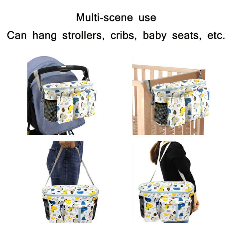 Multifunctional baby stroller storage bag in white dinosaur design, showcasing adjustable strap and spacious compartments for baby essentials.