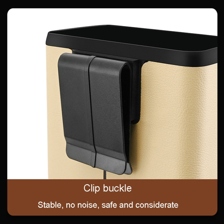 Multifunctional car dustbin hanging on a car seat, made of ABS and leather, designed for storage and waste disposal.