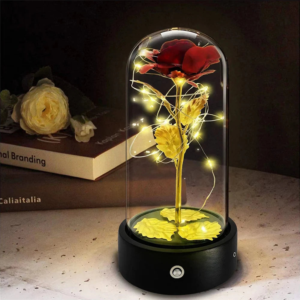 Beauty and The Beast Rose Music Box with LED lights in a glass dome, symbolizing eternal love and romance.