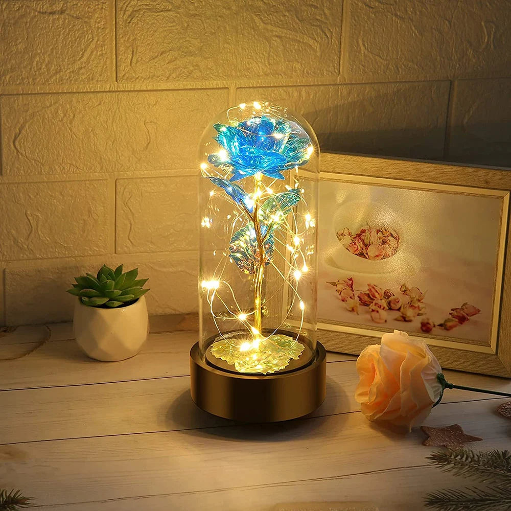 Beauty and The Beast Rose Music Box with LED lights in a glass dome, symbolizing eternal love and romance.