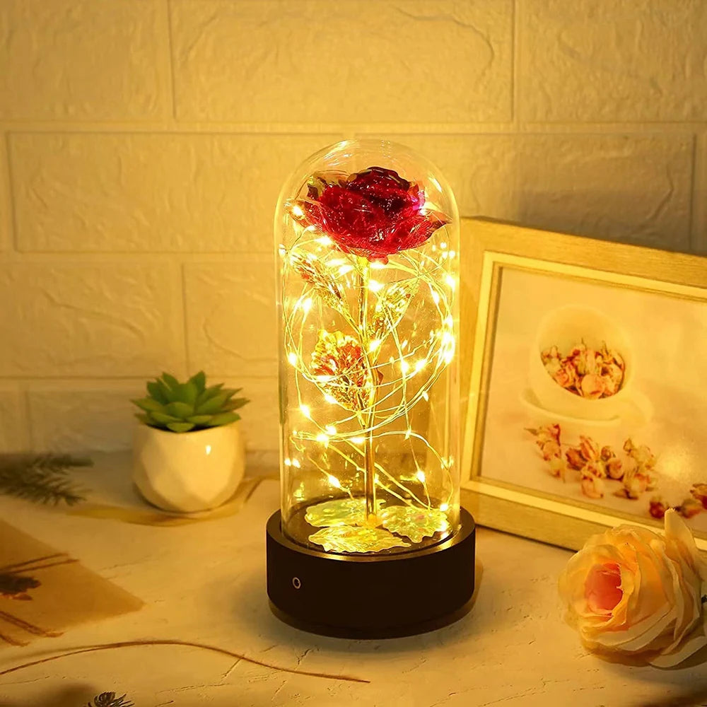Beauty and The Beast Rose Music Box with LED lights in a glass dome, symbolizing eternal love and romance.