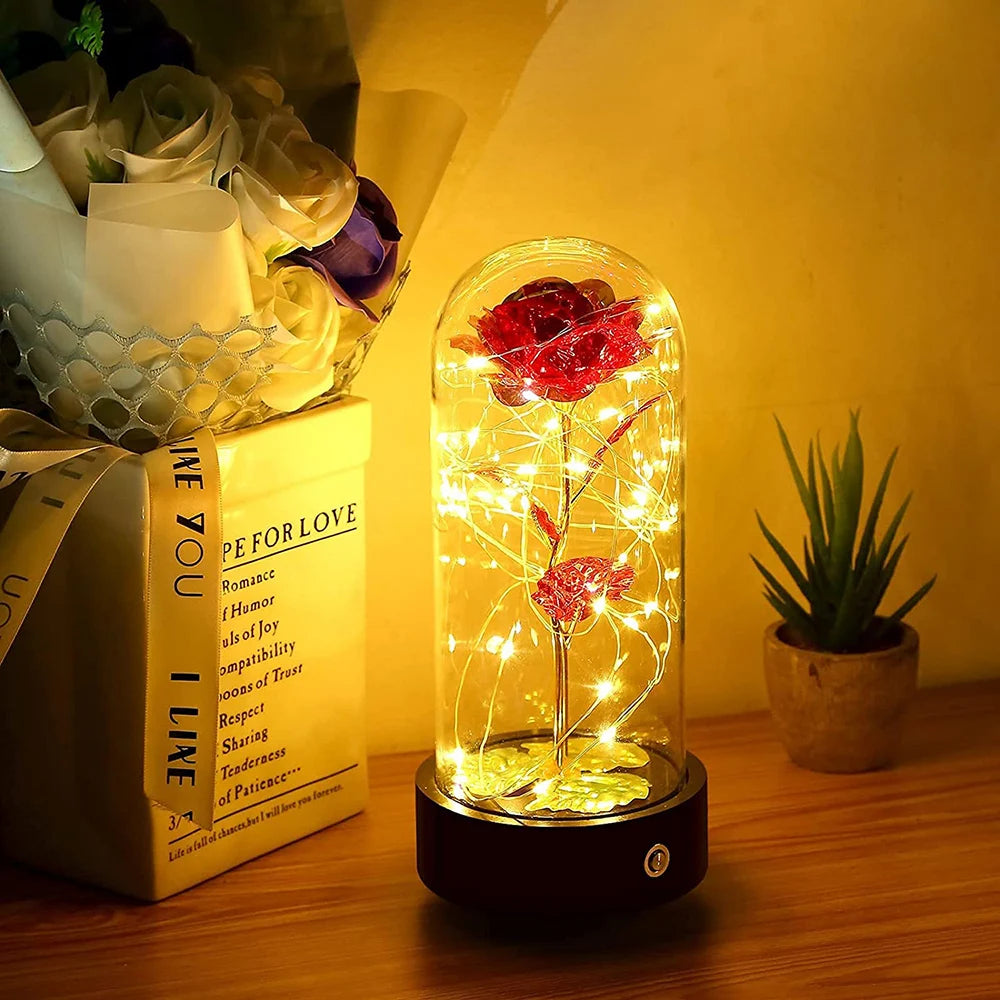 Beauty and The Beast Rose Music Box with LED lights in a glass dome, symbolizing eternal love and romance.