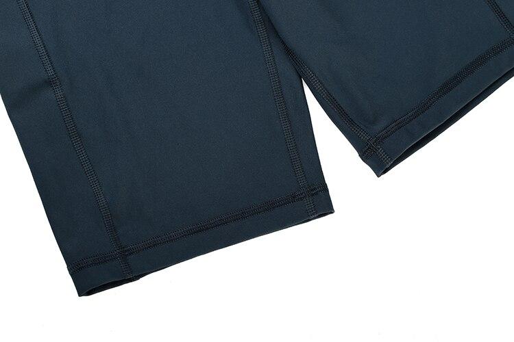 A pair of women's high-waisted biker shorts in solid color with pockets, designed for comfort and active wear.