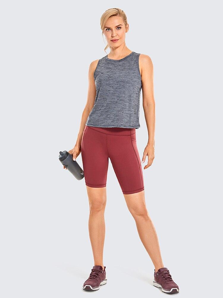 A pair of women's high-waisted biker shorts in solid color with pockets, designed for comfort and active wear.