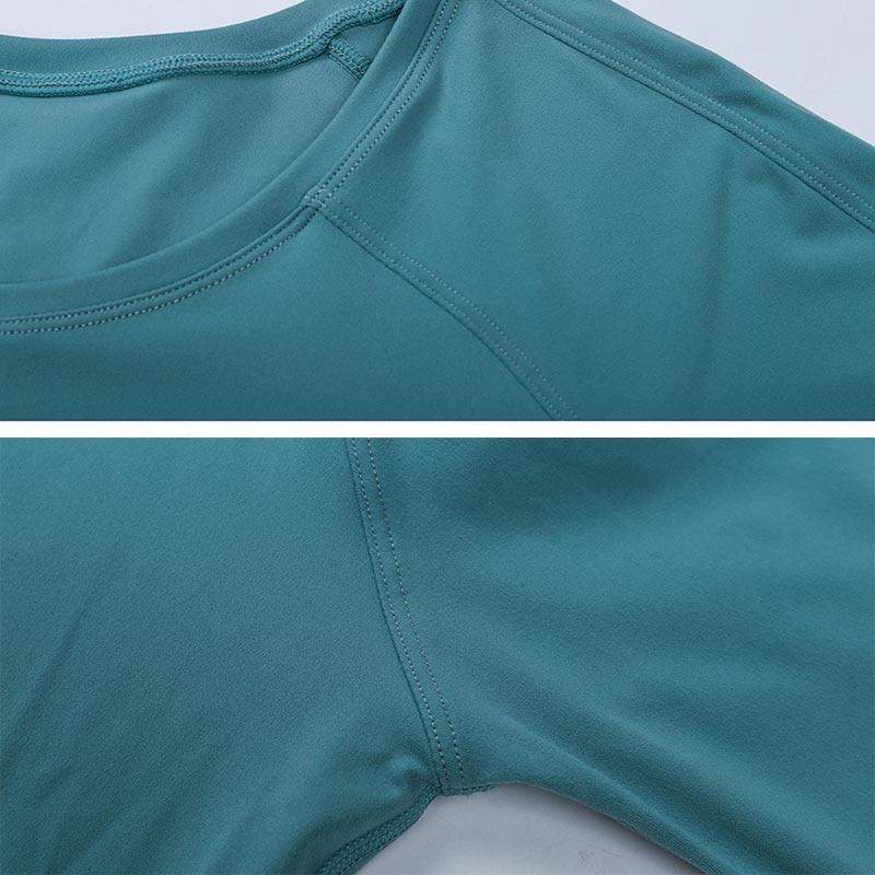 A woman wearing a lightweight, long-sleeved yoga shirt made from naked-feel fabric, ideal for workouts.