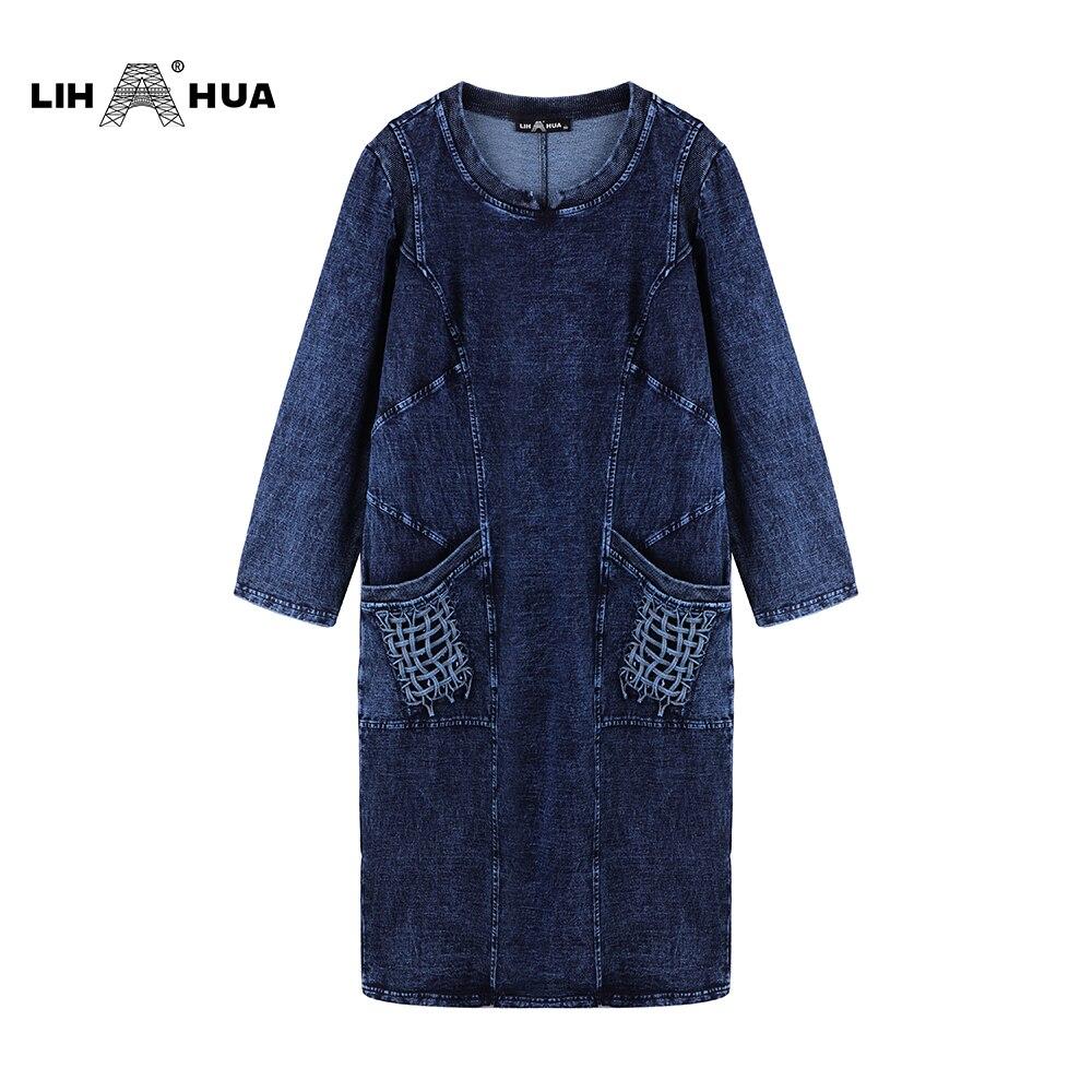 A stylish plus size denim dress featuring a slim fit, knee-length design, and three-quarter sleeves, perfect for casual autumn wear.