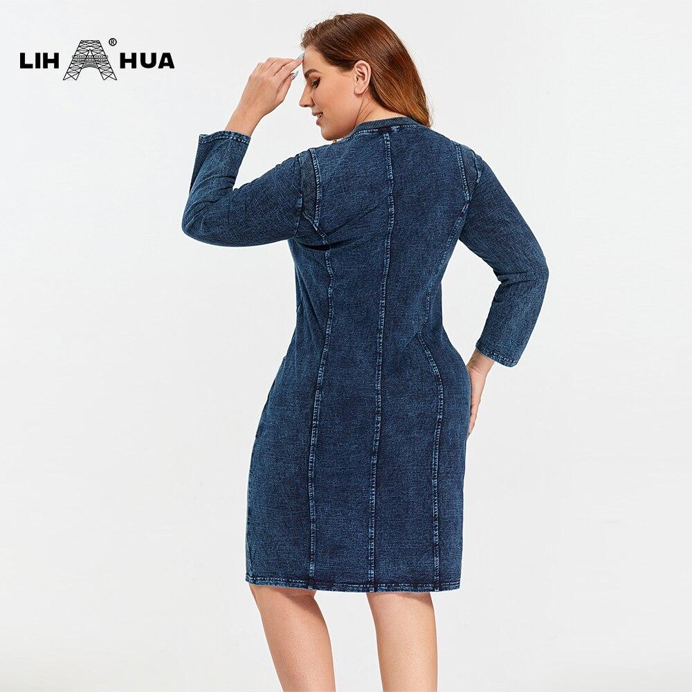 A stylish plus size denim dress featuring a slim fit, knee-length design, and three-quarter sleeves, perfect for casual autumn wear.